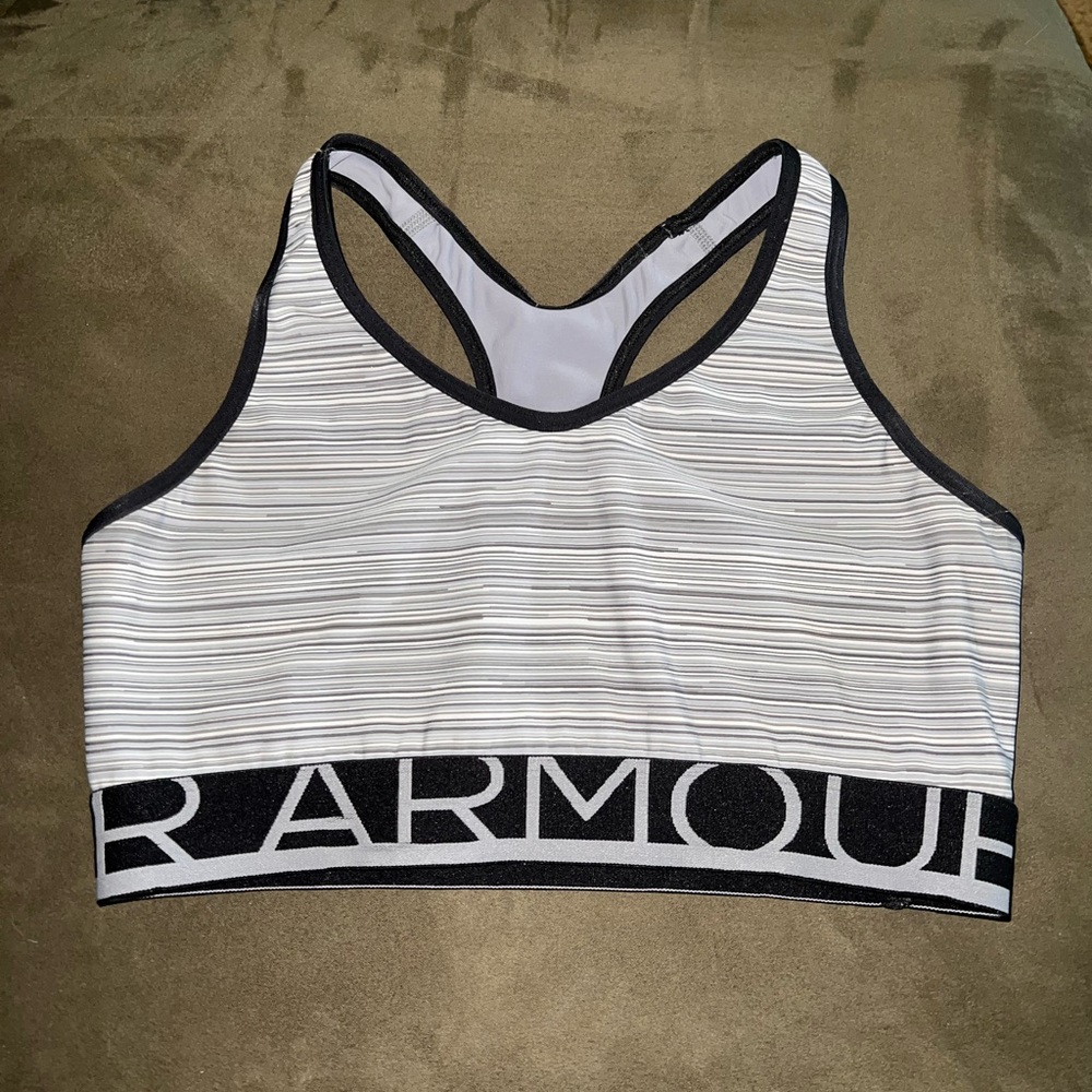 Under Armour sports bra size small/medium. Gray, white and black coloring.